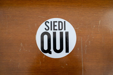Covid-19 sign where yoy may sit