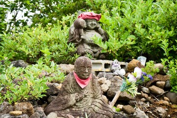 The statue of Japanese god at the mountain.