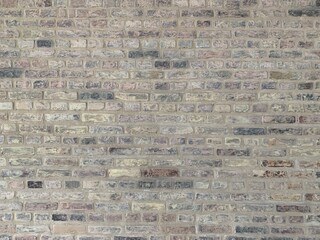 Brickwork texture for design. The brick wall is polished and painted. Background with space for text or image. Stone wall