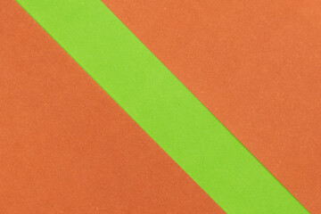 Fototapeta premium Green and Orange coloured paper background