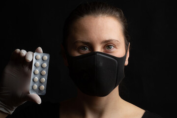 Girl with mask and pills - 374667995