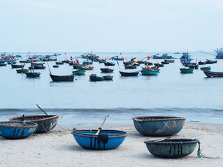 The traditional round basket boat on My Khe Beach, Danang, Vietnam.