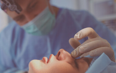 Man surgeon at work in operating room