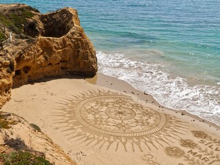 Beautiful beach mandala in Albufeira in Portugal Praia Maria Luisa