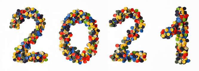 2021. New year, preparation for the holiday. numbers made of multicolored confetti on a white background.