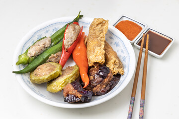 Variety of yong tau fu or stuffed tofu, popular Chinese food in Malaysia