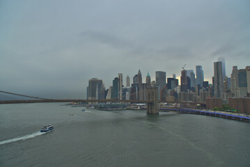 Cloudy Manhattan skyline from Manhattan Bridge, NYC, NY, USA