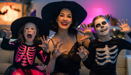 Happy family celebrating Halloween.