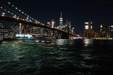 Brooklyn Bridge and Manhattan skyline from Empire Fulton Ferry Park, Brooklyn, NYC, NY, USA