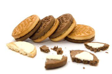 Sandwich cookies on a white background. Close-up. Cookie chunks and crumbs