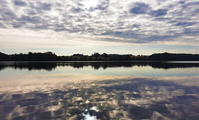 Fototapeta premium Beautiful contrasting sunset on the lake