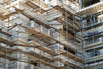 scaffolding and new building as background
