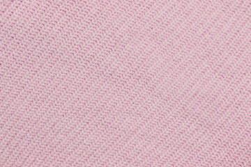 Diagonal knitted wool pink background
