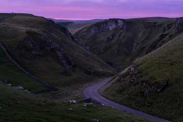 Pink sunrise on Winnats Pass in the Peak District