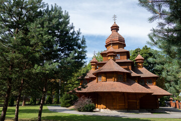The old wooden Christian church in the park of Lviv