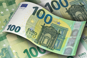 Fototapeta na wymiar One hundred EURO banknotes of the new sample close up