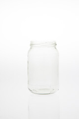 Isolated glass bottle on white background without cap.