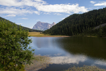 Fototapeta na wymiar DOLOMITES LANDSCAPE.. View from the walk from the forest path