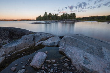 Stone islands, skerries, in the northern Ladoga lake in Karelia in Russia on a summer morning