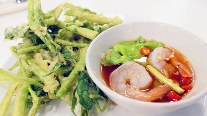 Chinese morning glory salad with shrimp.