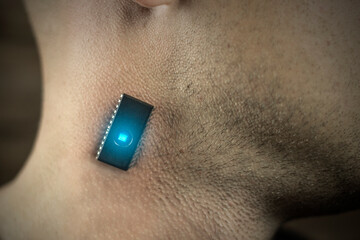 neck microchip in men behind the ear, close-up