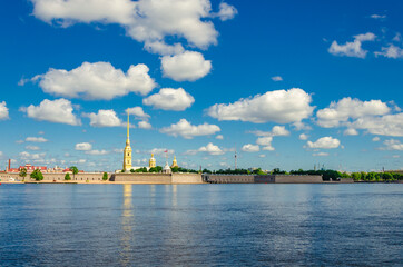 Fototapeta na wymiar Ancient Peter and Paul fortress on the river in Saint Petersburg.