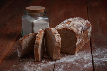 bread sprinkled with flour on a wooden table