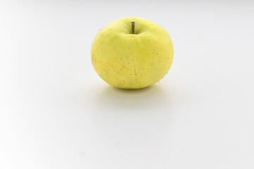yellow apple on white background