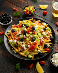Loaded potato Vegan Fries with tomato, cucumber, olives and feta cheese