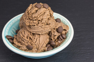 dark chocolate ice cream scoops with chocolate drops