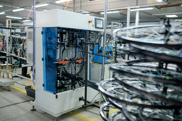 New bicycle wheels on professional assembly line