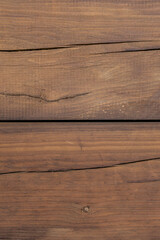 Old wooden plank background. Cracked weathered wood texture