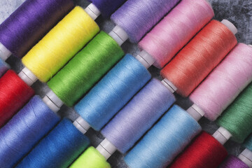  Colored threads on bobbins blue, green ,red.