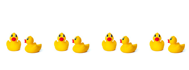 Banner yellow rubber ducklings on a white background.