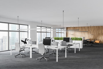 White and wooden open space office corner
