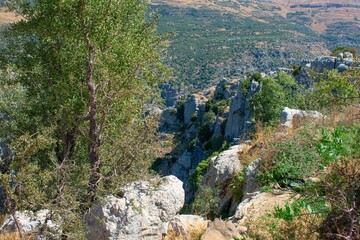 view from the edge of a cliff into a valley in lebanon