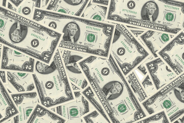 A bed of fake two-dollar bills thrown on the floor and piled on top of each other.