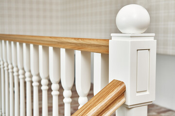 Detail of wooden staircase in bright apartment