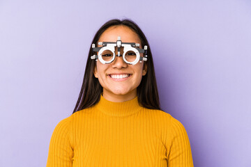 Youn indian woman with optometry glasses happy, smiling and cheerful.