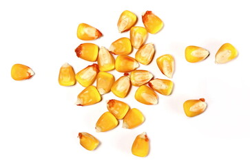 Corn kernels pile isolated on white background, top view