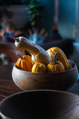 Several Squashes in a Wooden Bowl