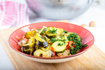 Zucchini Salad in dish on table. Fresh summer salad.