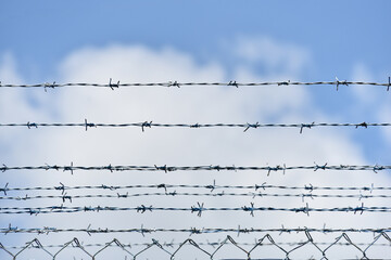Barbed wire fences around prisons Used to prevent prisoners from escaping From being arrested Detention in prison