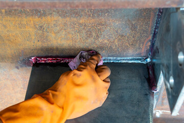Step to use rag wipe Liquid Penetrant out to welded surface before Developer spray into the welded...