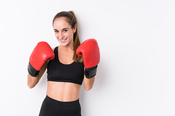 Young caucasian sporty woman boxing