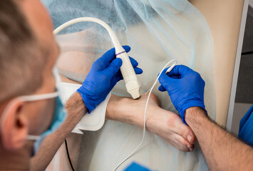 Cardiologist use tubes and ultrasound for radiofrequency catheter ablation.