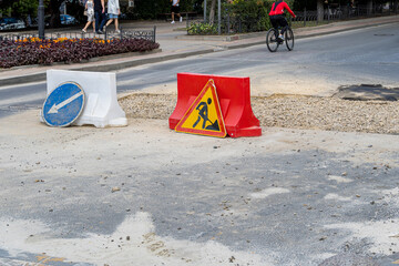Road repair caution work in progress sign