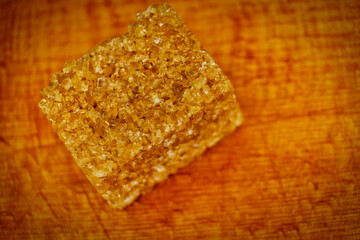 Brown sugar cube set on wooden background