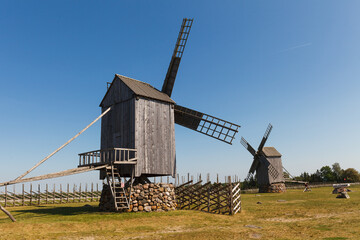 Fototapeta na wymiar Old windmill in Angla Heritage Culture Center. A Dutch-style windmills at Saaremma island Estonia