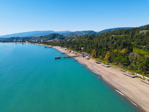 Coastline, beach, sea. Blue sea and sandy beach, view from above, view from quadcopter